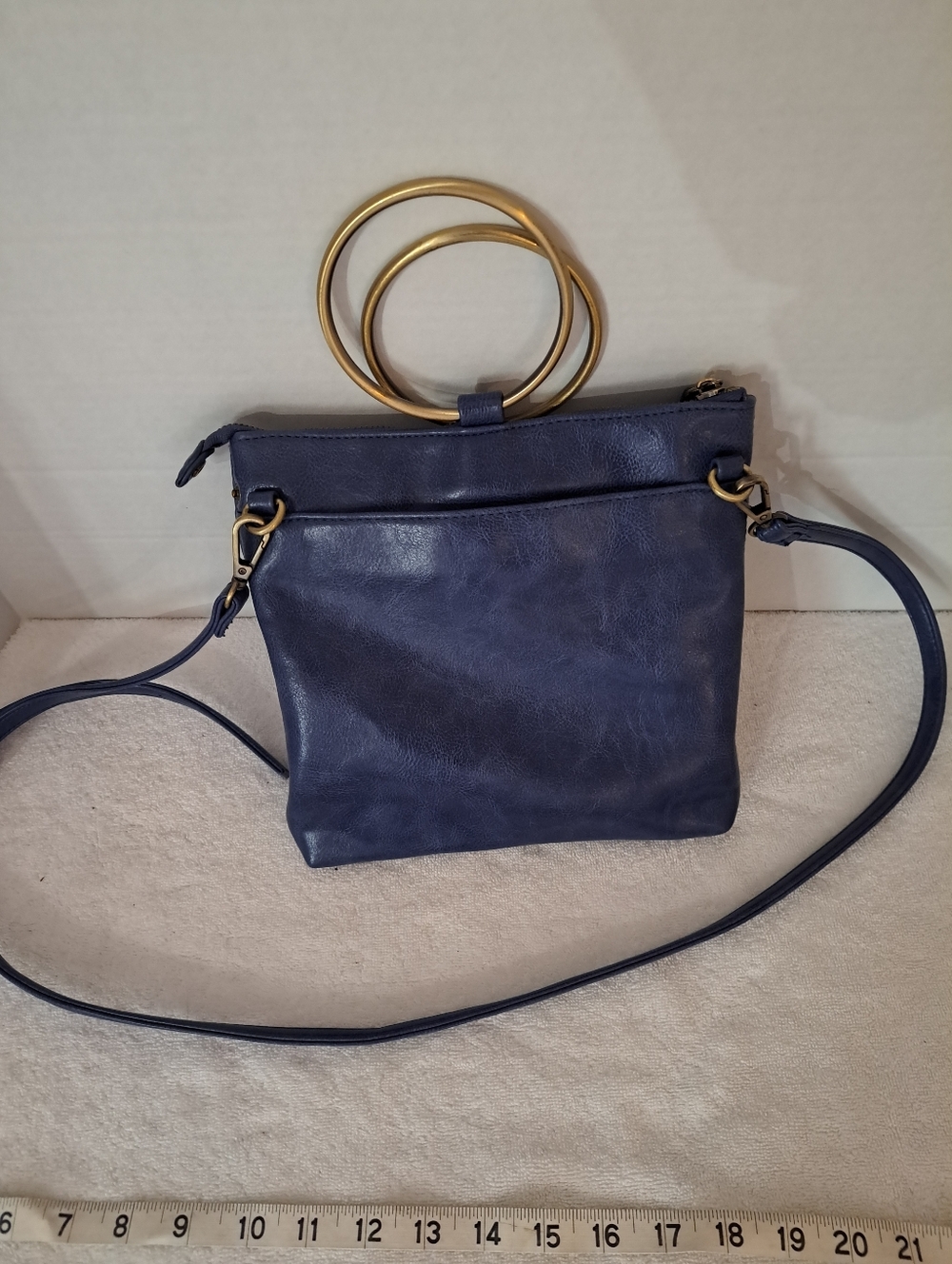 Joy Susan Navy Crossbody Bag with Gold Ring Handles And Adjustable Strap